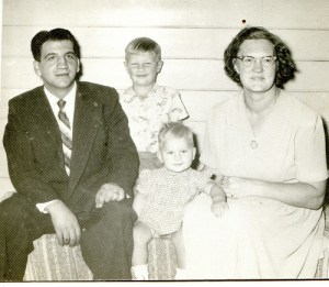 Our family in that kitchen in about 1957. N.B. I was a blond in those days.